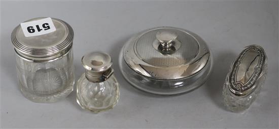 Three silver topped jars and a perfume bottle. A miniature silver tray, 2 silver thimbles, sherry label etc.